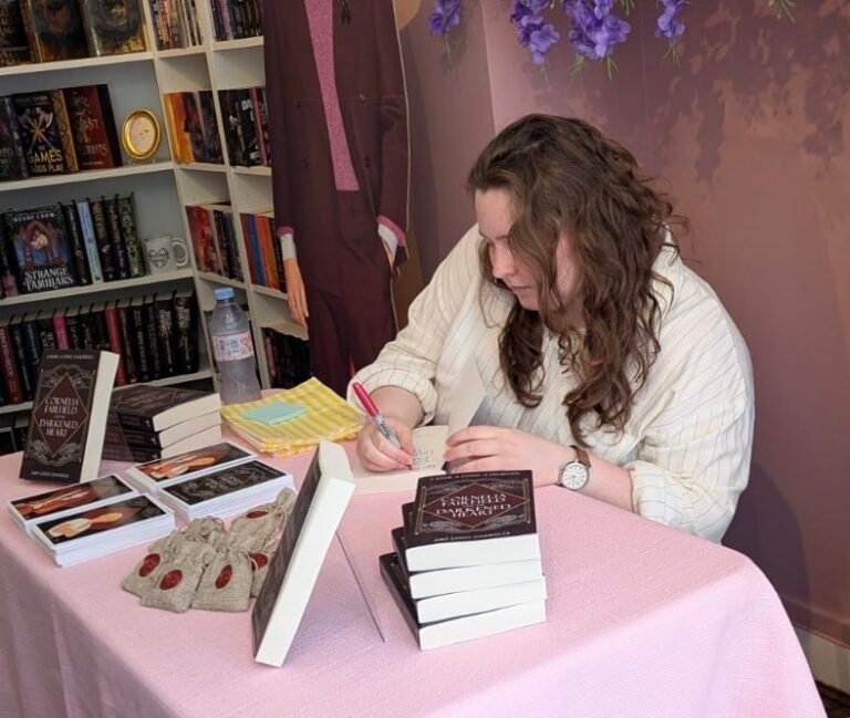 Fantasy author Amy Leigh Chandler signs copies of her debut pirate fantasy, Cornelia Fairfield and the Darkened Heart.